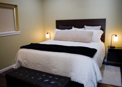 Elegant bedroom with white and black bedding