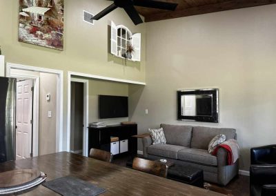 Cozy living room with high ceiling and modern decor