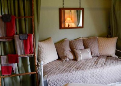 Cozy bedroom interior with wooden bamboo furniture