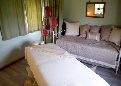 Cozy, well-decorated bedroom with plush bedding